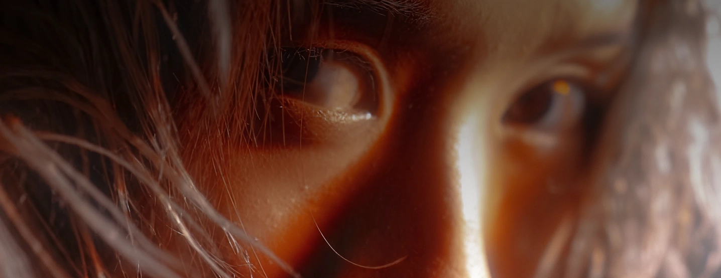 Close-up cinematic portrait.